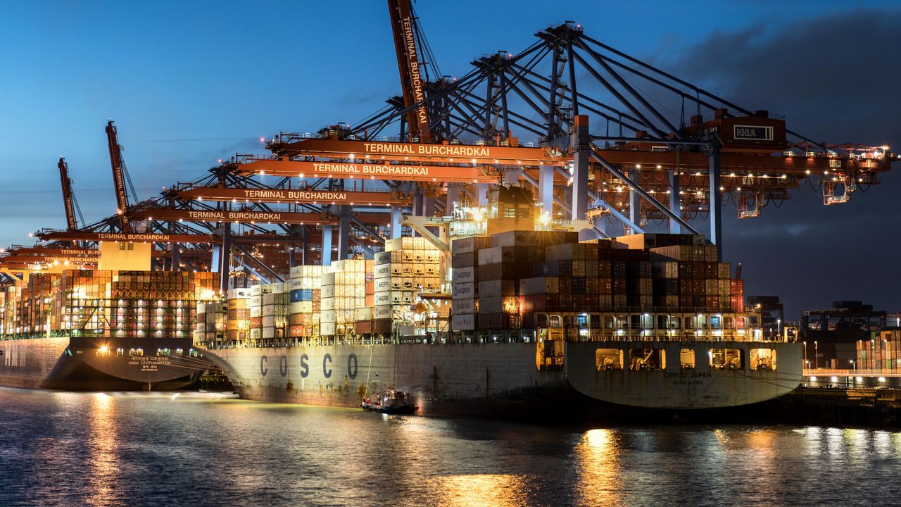 Crafting Captivating Headlines: Your awesome post title goes here Vibrant evening view of cargo operations at Terminal Burchardkai, Hamburg.